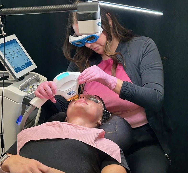 Laser treatment facial in a skincare clinic.
