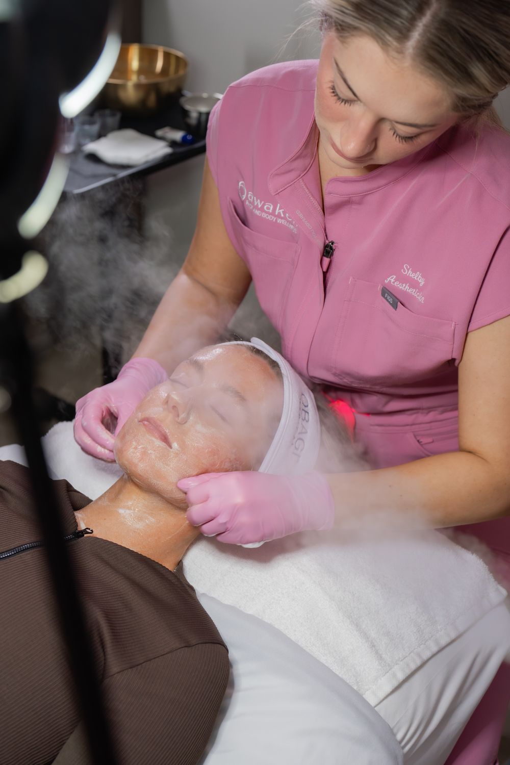Woman in activewear with long, flowing hair.