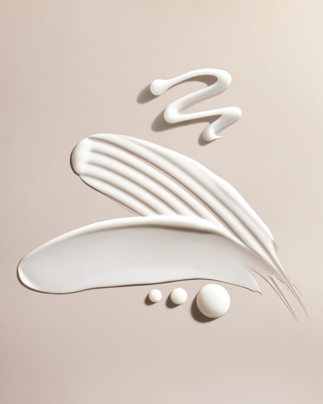 Woman in activewear with long, flowing hair.