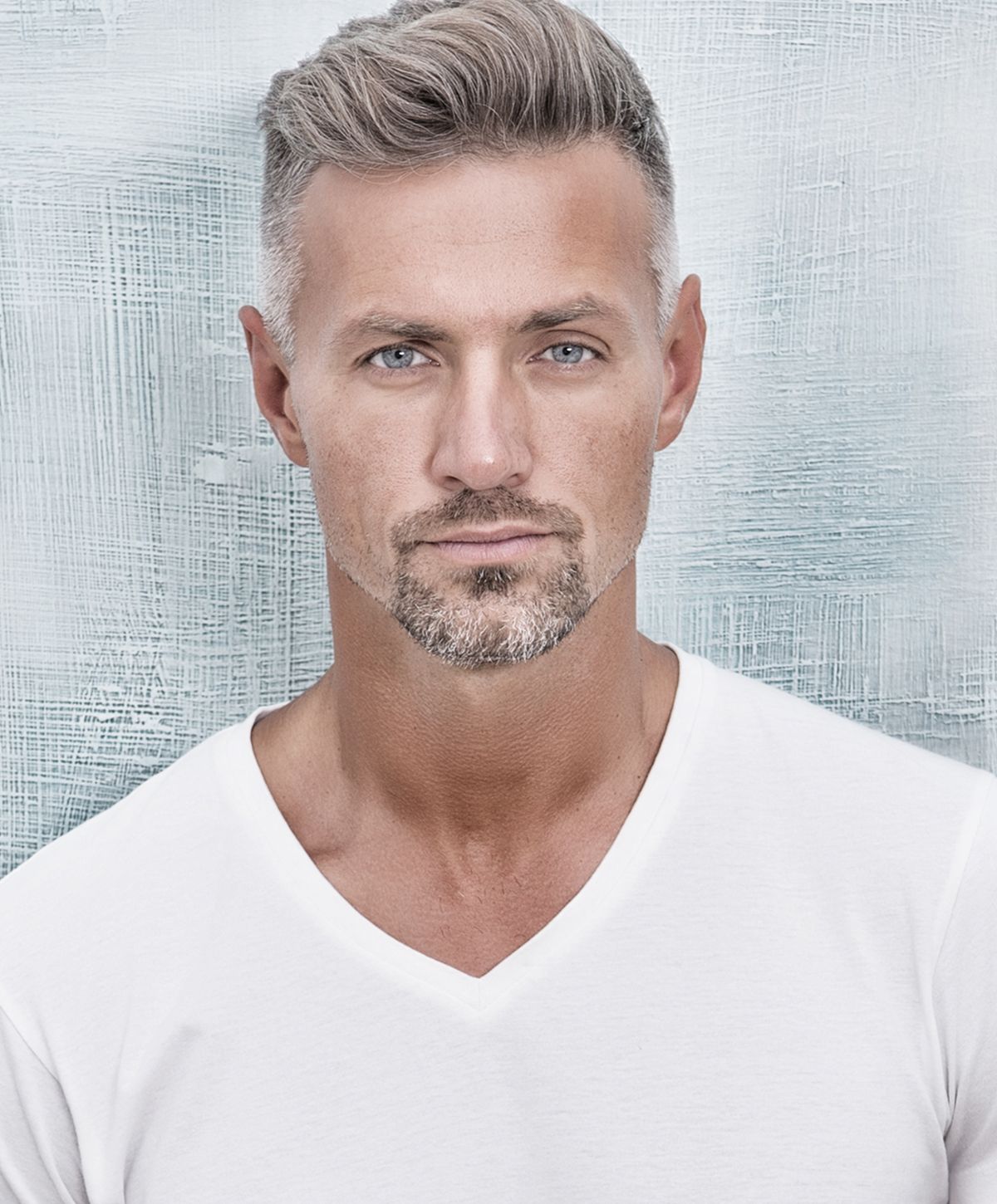 Woman in activewear with long, flowing hair.