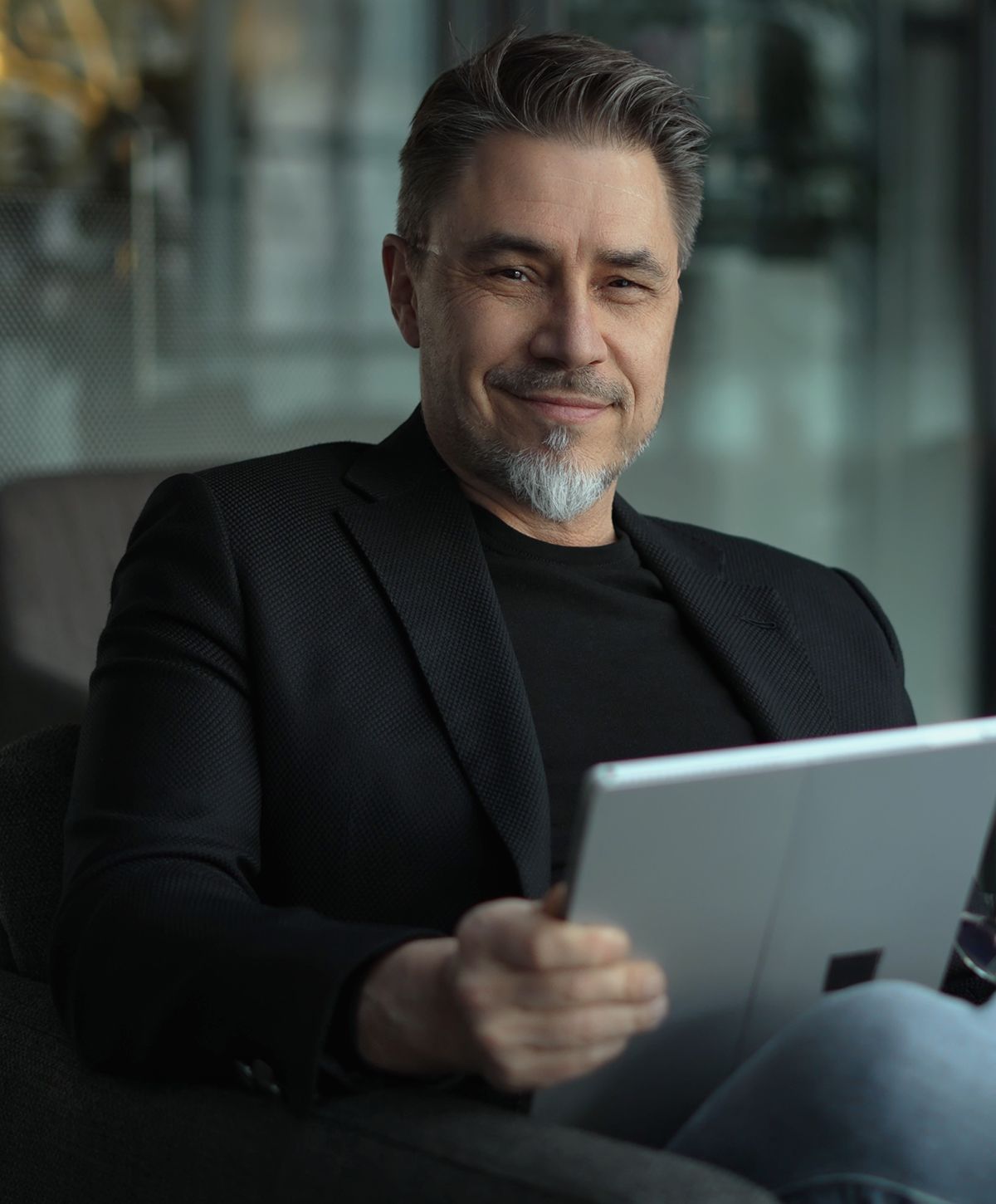 Woman in activewear with long, flowing hair.